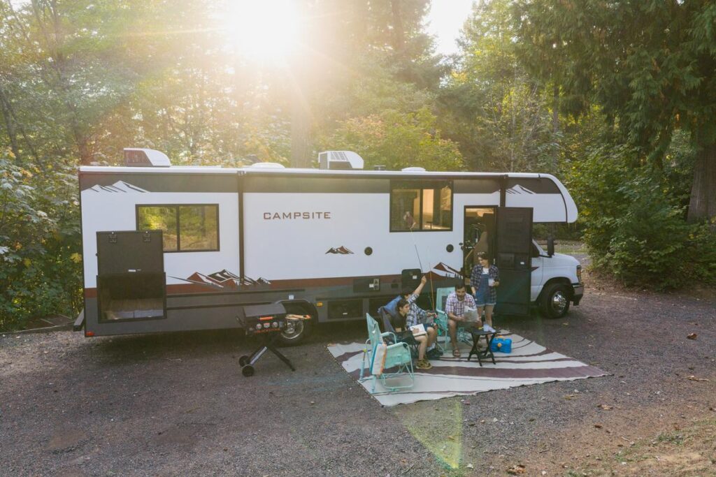 Family camping in Campsite Class C Motorhome