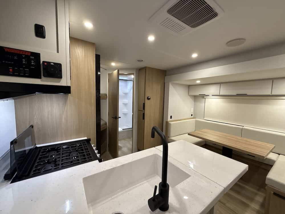 2026_winnebago_thrive_22mbh_rv820911_impel-capture_close-up_wide-interior-living The Best Travel Trailers with Murphy Beds