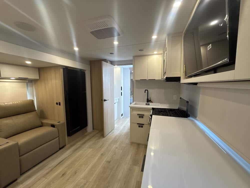 2026_winnebago_thrive_25rls-kitchen Why a Rear Dinette Travel Trailer?