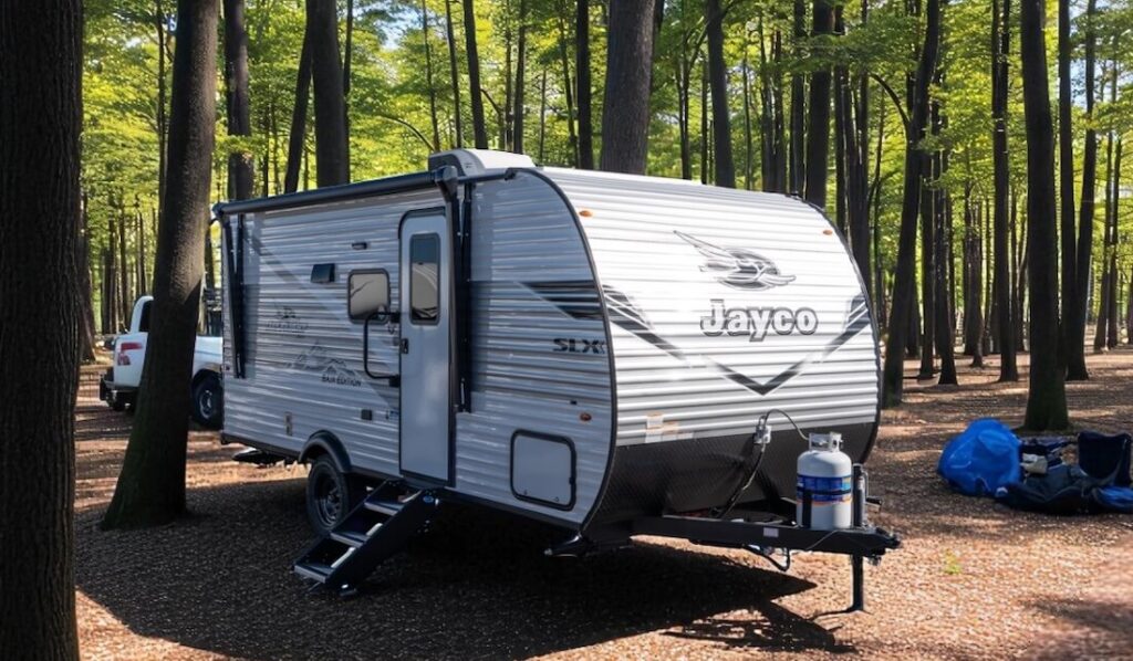 jayco 175BH camper in the woods