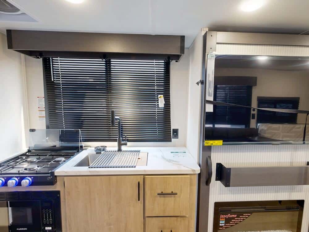 Image of the galley kitchen for the Campsite Reserve 20AJ. 