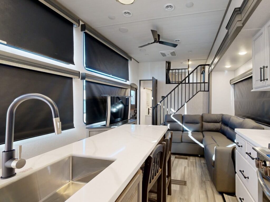 RV kitchen with stairs in background