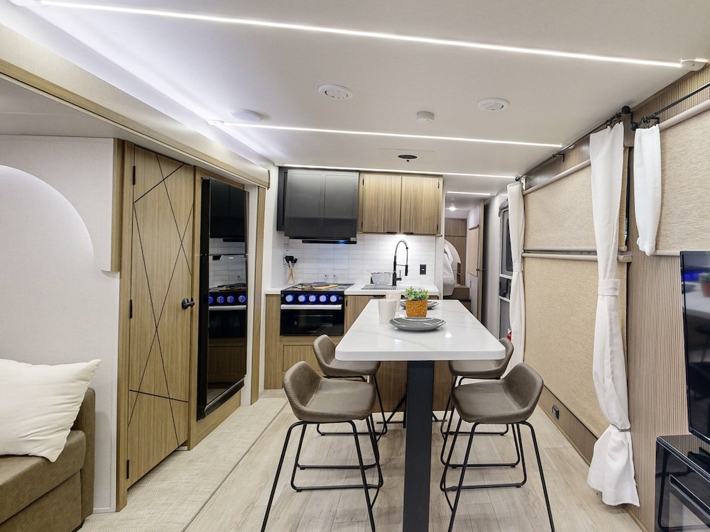 Forest-River-Salem-32VERANDA-2025-wideinteriorliving travel trailer with patio