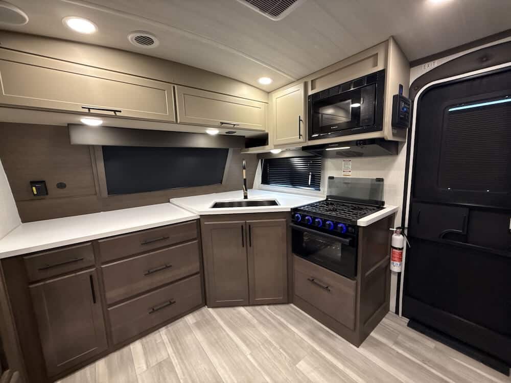 2026_keystone_cougar_25fkd_rv819142_impel-capture_close-up_front kitchen travel trailer