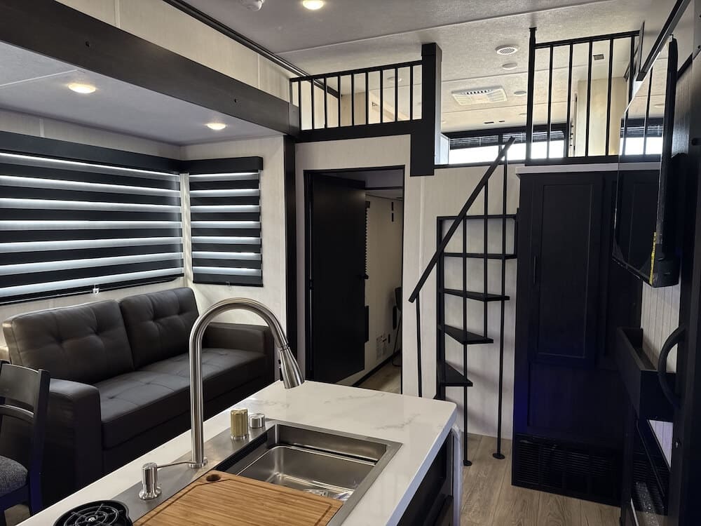 Image of living area featuring kitchen island and couch from the Vengeance Rogue Store 297STORE.