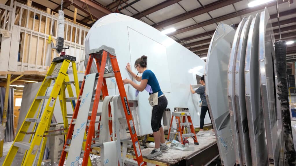 Staff working on Cougar HyperCore sidewalls