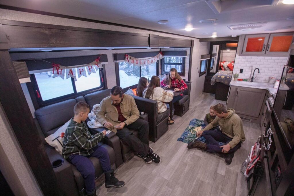 Family gathering in a 4 season RV during the winter holidays