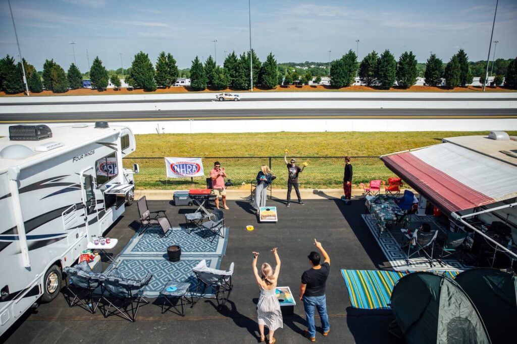 Family playing tailgate games at NHRA race