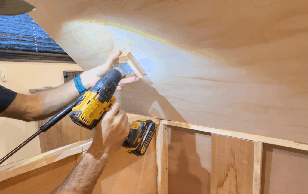 Securing wooden blocks to RV bed platform