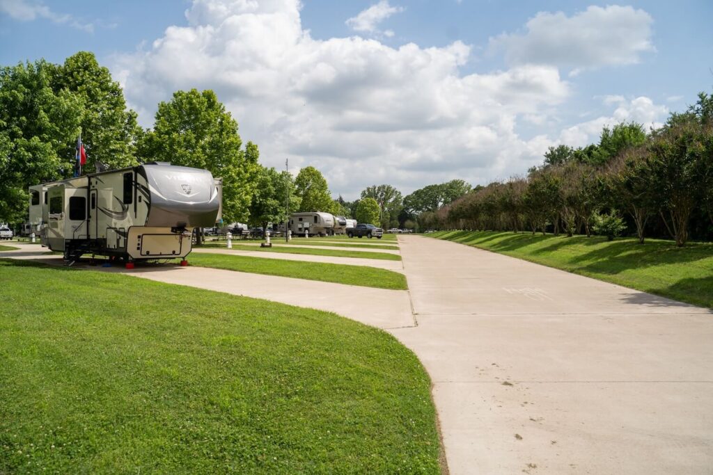 Grassy campground with RV driveways