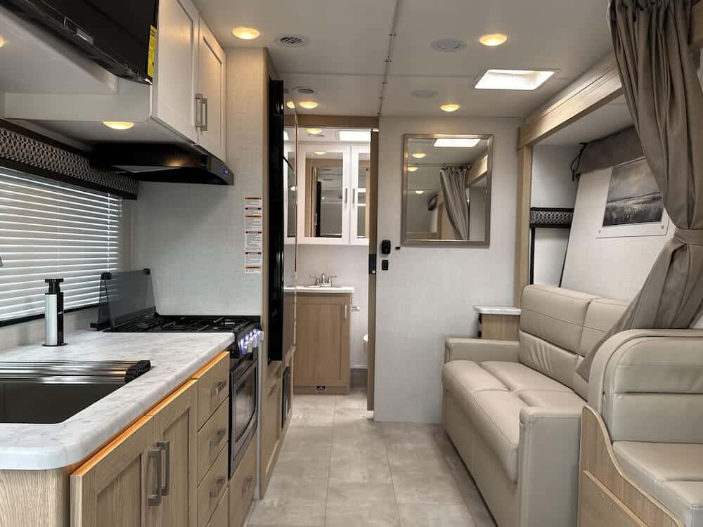 2026_thor_freedom_elite_24fl_rv817344_impel-capture_close-up_wide-interior-living top rated class c motorhomes