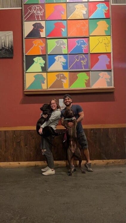 Manny and Hope with their two dogs