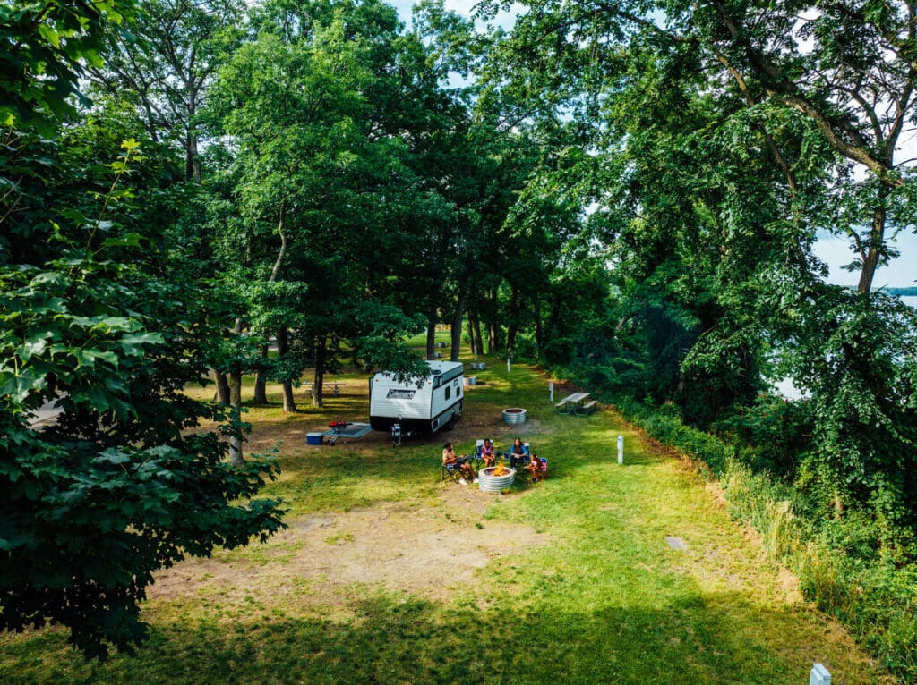Shaded campsites are great when learning how to keep RV cool in summer