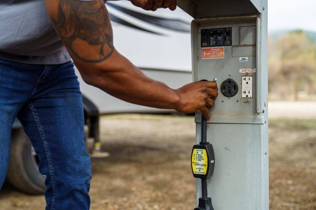 man checking rv power supply