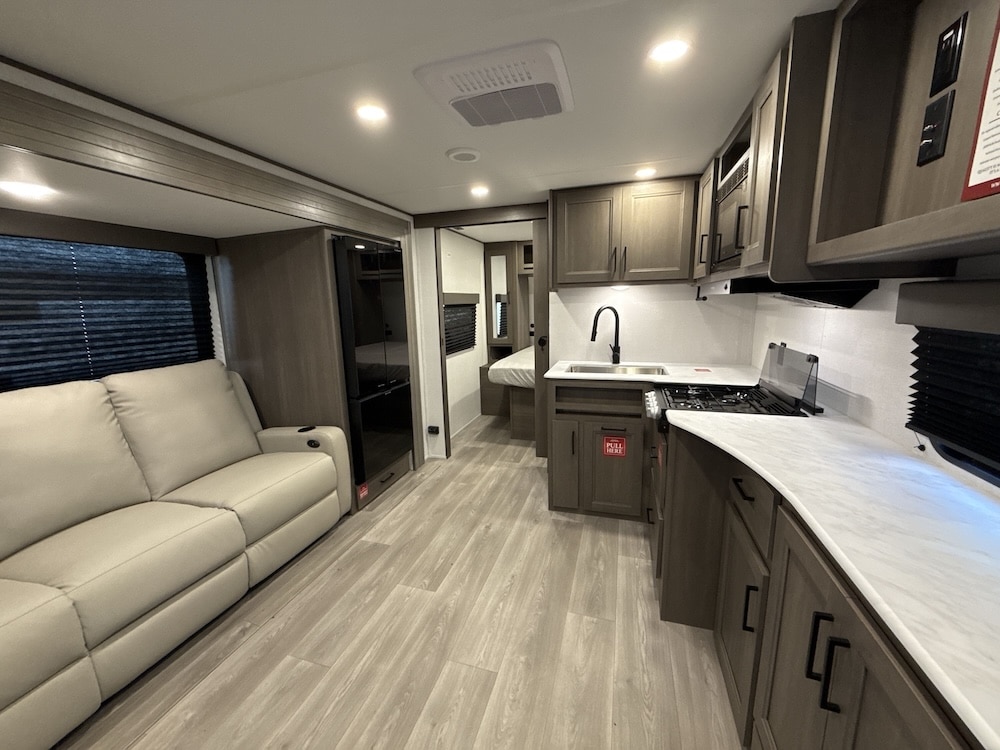 2026_grand_design_transcend_xplor_22rbx kitchen and living room front