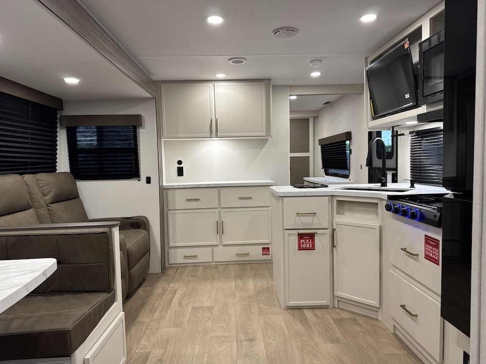 2026_grand_design_transcend_335bht kitchen and living area