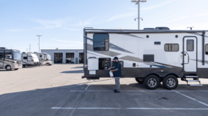 Certified technician professionally winterizing an RV