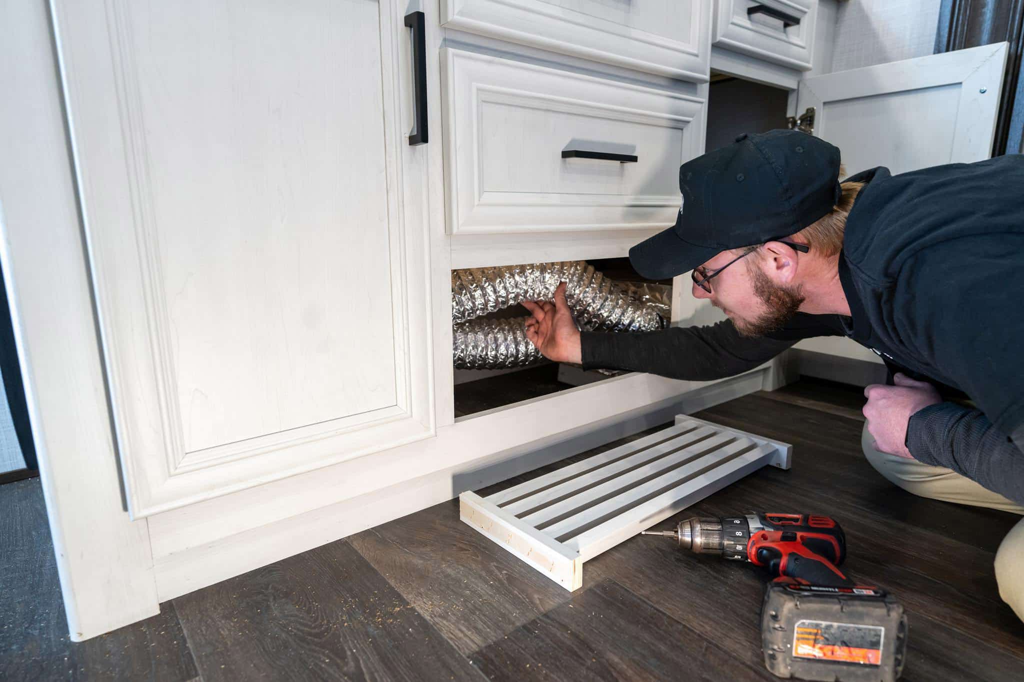 Technician performing RV furnace repair